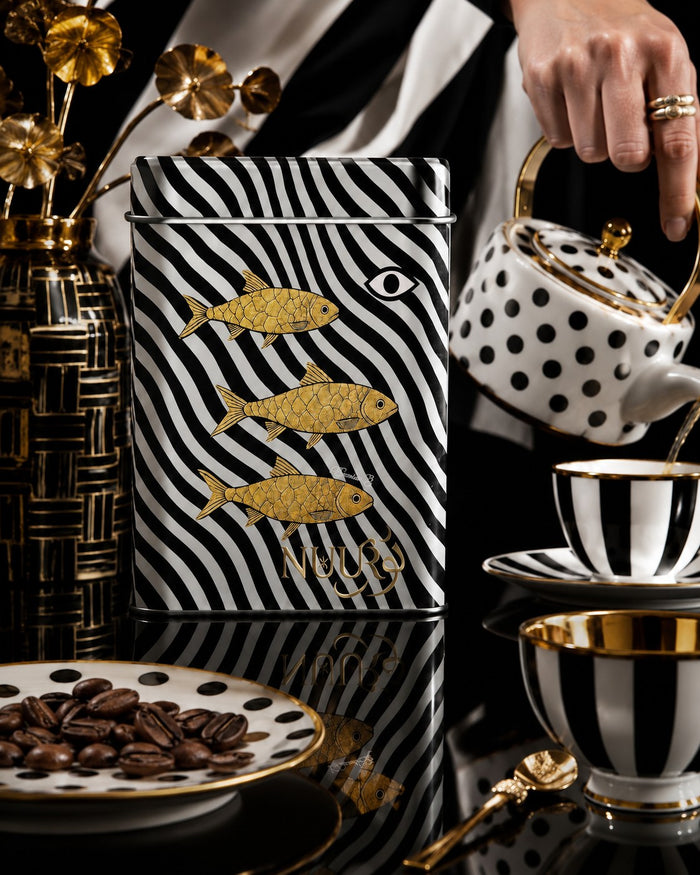 Manaima zebra-wave artwork tin with golden teapot pour